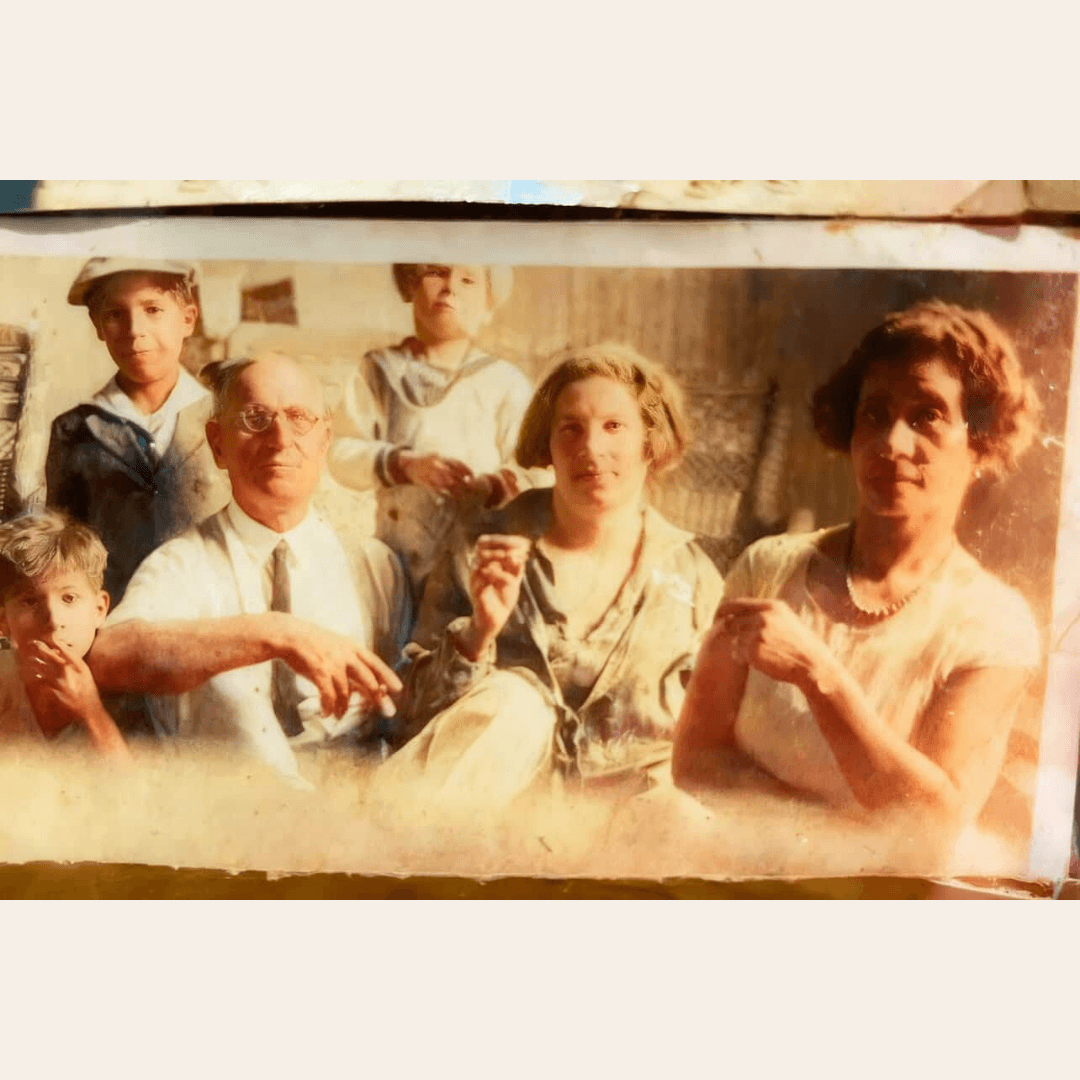 Historical family group photograph from the De Angelis family archive.